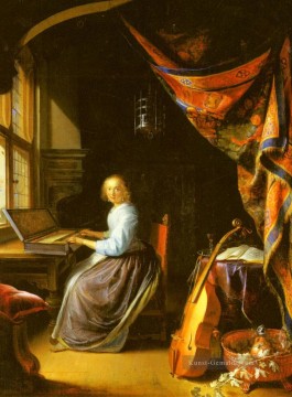  gold - Eine Frau spielt ein Clavichord Goldenes Zeitalter Gerrit Dou